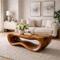 Solid Wood Coffee Table with Sculptural Wave Base and Organic Hand-Carved Design - view 1 of 9